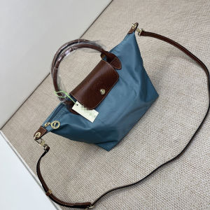 Foldable single-shoulder bag lightweight and large-capacity travel bag fashionable student bag short-handle dumpling-shaped bag commuting tote bag