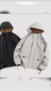Black hooded jacket with brown lining drawstring cuffs and pockets