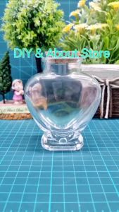 ขวดหัวใจสูง 9.7 ซ.ม. พร้อมจุกปิดฝาคละสี มีให้เลือกหลายแบบ