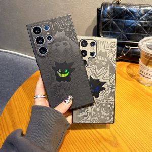 CrashStar Laser Embossed Gengar Anime Pokemon Leather Hard Shockproof Phone Case With Wristband Stand For Samsung Galaxy S25 S24 Ultra + S23 S22 Ultra A55 A54 A15 5G A16 Fashion Funny Black Gray Phone Casing Cover With Full Cover Lens Camera Protection