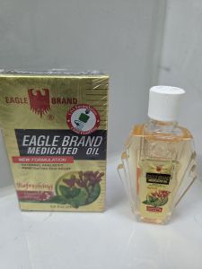Dầu vàng hương đinh hương chai 24ml dầu xoa bóp hương thơm chai thủy tinh hộp giấy thương hiệu Eagle Brand.