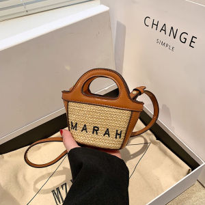 พรีเมี่ยม พื้นผิว กระเป๋าถือทอฟางย้อนยุค ผู้หญิง ฤดูใบไม้ผลิ ฤดูร้อน 2023 ใหม่กระเป๋าถังเล็กกระเป๋าสะพายข้างแฟชั่น