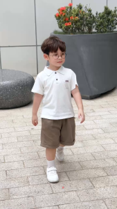 Set bộ polo tay ngắn màu trắng kem họa tiết in túi  kèm quần short bé trai 1đến 7t BERNIE H0225B25