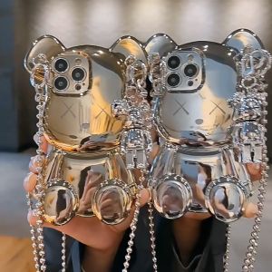 Ốp lưng chống sốc luxury cho iPhone 13 Pro / 13 Pro Max / 14 Pro / 14 Pro Max kiểu dáng gấu Kaws có dây đeo và gấu mini siêu cute hiệu HOTCASE - thiết kế sang trọng nữ tính chống sốc cực tốt chất liệu cao cấp - Phân phối bởi Hotphu