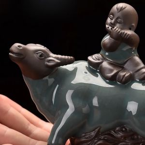 Tượng Mục đồng cưỡi trâu chất liệu Gốm Tử Sa men rạng nhập khẩu làng nghề đúc tượng mỹ nghệ Tỉnh Phúc Kiến Trung Quốc