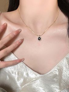 Womens Titanium Steel Cats Eye Stone Pendant Necklace Fashionable Lightweight Luxury  out Snake Bone Chain Jewelry