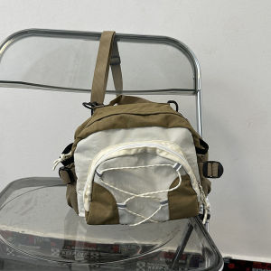 กระเป๋าเป้สะพายหลังมีสไตล์เฉพาะตัวออกแบบเองกระเป๋าสะพายข้างสีตัดกันอเนกประสงค์ขนาดมินิสำหรับผู้ชายกระเป๋าถือสะพายหลังสไตล์วินเทจใบเล็กสำหรับผู้หญิง