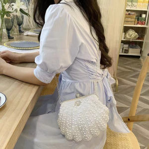 กระเป๋าถือผู้หญิงแบบถือได้ กระเป๋าเยาวชนสไตล์หวาน กระเป๋าเยาวชนฤดูใบไม้ผลิ 2024 กระเป๋าถือสีพื้นขนาดเล็ก กระเป๋าถือแบบมีหัวเข็มขัดแบบพับไม่ได้