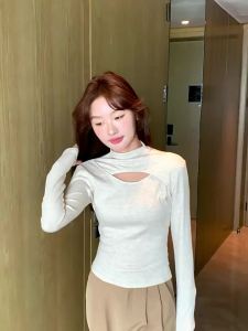 Dazzlin เย็บขุดหลุมรุ่นใหม่ฤดูใบไม้ร่วงและฤดูหนาวเสื้อตัวในสำหรับผู้หญิงคอสูงครึ่งกลวงออกแบบสาวฮอตแขนยาว T เสื้อผู้หญิง