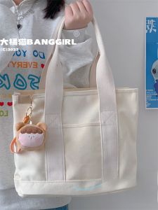 กระเป๋าผ้าแคนวาสความจุขนาดใหญ่สําหรับผู้หญิงที่มีแมวสีส้มตัวใหญ่ ดีไซน์ เหมาะสําหรับการเดินทางและชั้นเรียน หลากหลาย กระเป๋าสีทึบ นักเรียน