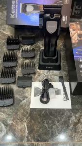 Tông đơ cắt tóc Kemei KM-5083 thiết kế mới lạ có LED báo dung lượng pin có 8 cữ đi kèm