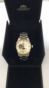 Đồng hồ cơ nam Orient Watch Sun And Moon RA-AS000 lộ cơ máy automatic dự trữ năng lượng 40 tiếng lên cót tự động mặt kính sapphire chống xước chống nước 5 ATM dây thép đeo tay chính hãng