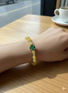 Vòng tay chuỗi hạt đá thạch anh mắt hổ vàng thiên nhiên mic charm 4 lá may mắn