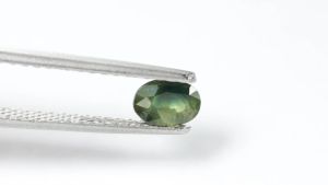 70 ct พลอยแท้ เขียวส่อง เผาเก่า ทรงไข่ บางกะจะ จันทบูรี กระเป๋าเดินเชิงวัฒนา