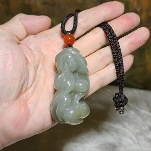 Premium Nephrite light green with caramel brown 3-dimensional "Getting Ones Savior" (Jade Beauty) handheld / large pendant (with certificate)  精品和田玉且末青白帶糖立体遇贵人(玉美人)手把(带证书)