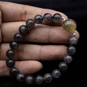 สร้อยข้อมือหินนำโชคแก้วขนเหล็ก (Rutilated Quartz Black ) และไหมทอง (Golden Rutilated Quartz)อัญมณีหินแห่งการปกป้อง ความมั่งคั่งร่ำรวย ดมสมบูรณ์
