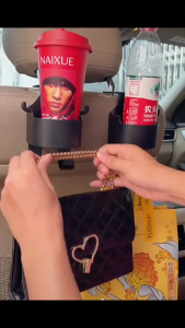 ผู้จัดงานพนักพิงศีรษะที่นั่งรถยนต์ 2 ชิ้น ที่วางถ้วย 3-in-1 และที่วางโทรศัพท์มือถือและตะขอเก็บของ เบ็ดเบ็ดแบ็คเบาะแบบอเนกประสงค์สำหรับกุญแจกระเป๋าถือ สากลสำหรับรถยนต์อุปกรณ์การเดินทางแบบพกพา