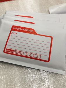 ที่รองรับ ++ ซองการ์ด 50 หมอน สีขาวเคลือบลามิเนตพิมพ์จ่าหน้าขาว-แดง ขนาด 4.8x7.6 นิ้ว