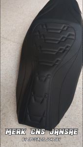 Kulit Jok Motor Variasi Merk CNS: Jansae Kulit Jok Motor Custom untuk Vario, Scoopy, dan PCX\\n\\n Apa Itu Kulit Jok Motor Merk CNS?\\n\\nKulit jok motor merk CNS adalah produk jok motor yang dirancang khusus dengan kualitas dan keunggulan tertentu. Merk CNS merupakan salah satu produsen jok motor yang terkenal dengan produk berkualitas tinggi dan tahan lama.\\n\\n Kualitas & Keunggulan Kulit Jok Motor Merk CNS\\n\\nKulit jok motor merk CNS memiliki beberapa keunggulan, antara lain:\\n\\n- **Bahan berkualitas**: Kulit jok motor merk CNS terbuat dari bahan kulit sintetis atau kulit asli yang berkualitas tinggi, sehingga tahan lama dan nyaman digunakan.\\n- **Desain modern**: Desain jok motor merk CNS modern dan stylish, sehingga cocok untuk berbagai jenis motor, termasuk Vario, Scoopy, dan PCX.\\n- **Kenyamanan**: Kulit jok motor merk CNS dirancang untuk memberikan kenyamanan maksimal saat berkendara, baik untuk pengendara maupun penumpang.\\n\\n Perbedaan Kulit Jok Motor Merk CNS dengan Merk Lain\\n\\nBeberapa perbedaan antara kulit jok motor merk CNS dengan merk lain adalah:\\n\\n- **Kualitas bahan**: Bahan kulit jok motor merk CNS lebih berkualitas dibandingkan dengan merk lainnya.\\n- **Desain**: Desain jok motor merk CNS lebih modern dan stylish dibandingkan dengan merk lainnya.\\n- **Kenyamanan**: Kulit jok motor merk CNS lebih nyaman digunakan dibandingkan dengan merk lainnya.\\n\\n Cara Memilih Kulit Jok Motor Custom yang Tahan Lama\\n\\nUntuk memilih kulit jok motor custom yang tahan lama, perhatikan beberapa hal berikut:\\n\\n Jenis Kulit Jok Motor Custom yang Berkualitas\\n\\nBeberapa jenis kulit jok motor custom yang berkualitas antara lain:\\n\\n- **Kulit sintetis**: Kulit sintetis memiliki kualitas yang baik dan tahan lama, serta mudah dibersihkan.\\n- **Kulit asli**: Kulit asli memiliki kualitas yang lebih baik dibandingkan dengan kulit sintetis, namun harganya lebih mahal.\\n\\n Tips Memilih Kulit Jok Motor Custom untuk Vario, Scoopy, dan PCX\\n\\nBeberapa tips memilih kulit jok motor custom untuk Vario, Scoopy, dan PCX antara lain:\\n\\n- **Pilih bahan berkualitas**: Pilih kulit jok motor custom yang terbuat dari bahan berkualitas tinggi, baik kulit sintetis maupun kulit asli.\\n- **Perhatikan desain**: Pilih kulit jok motor custom yang memiliki desain modern dan stylish, sesuai dengan model motor Anda.\\n- **Perhatikan kenyamanan**: Pilih kulit jok motor custom yang memberikan kenyamanan maksimal saat berkendara, baik untuk pengendara maupun penumpang.\\n\\n Mempertahankan Kualitas Kulit Jok Motor\\n\\nAgar kulit jok motor tetap awet dan berkualitas, perhatikan beberapa hal berikut:\\n\\n Cara Membersihkan & Merawat Kulit Jok Motor\\n\\nBeberapa cara membersihkan dan merawat kulit jok motor antara lain:\\n\\n- **Bersihkan secara rutin**: Bersihkan kulit jok motor secara rutin dengan menggunakan lap kering atau lap basah yang sudah dicuci bersih.\\n- **Gunakan produk pembersih khusus**: Gunakan produk pembersih khusus kulit jok motor untuk membersihkan jok motor dengan lebih efektif.\\n- **Lindungi dari sinar matahari langsung**: Lindungi kulit jok motor dari sinar matahari langsung dengan menggunakan penutup jok motor atau parkir di tempat teduh.\\n\\n Menghindari Kerusakan pada Kulit Jok Motor\\n\\nBeberapa cara menghindari kerusakan pada kulit jok motor antara lain:\\n\\n- **Jangan duduki dengan sepatu**: Jangan duduki kulit jok motor dengan sepatu, karena bisa merusak permukaan kulit jok motor.\\n- **Hindari benda tajam**: Hindari meletakkan benda tajam di atas kulit jok motor, karena bisa merusak permukaan kulit jok motor.\\n- **Jangan duduki dengan barang berat**: Jangan duduki kulit jok motor dengan barang berat, karena bisa merusak struktur kulit jok motor.\\n\\nJadi, kulit jok motor merk CNS adalah pilihan yang tepat untuk Anda yang mencari jok motor berkualitas tinggi dan tahan lama. Dengan memperhatikan cara memilih dan merawat kulit jok motor, Anda bisa mempertahankan kualitas kulit jok motor agar tetap awet dan nyaman digunakan.\n}