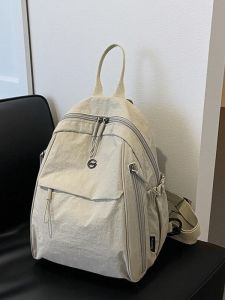 กระเป๋าเป้สะพายหลังผ้าไนลอนเบาๆ สำหรับเดินทาง กระเป๋าสะพายไหล่แบบนิ่ม สำหรับเด็กและเยาวชน กระเป๋าเป้สะพายหลังแบบมีซิปสำหรับเดินทาง