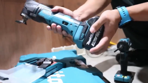 [Brand Authorization] MAKITA DTM52/50 18V multi-purpose tool rechargeable brushless woodworking multi-function cutting grinding and trimming machine comes with 2 batteries