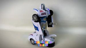 MALL QUALITY TOYS. TRANSFORMING ROBOT CAR BATTERY OPERATED W/MUSIC