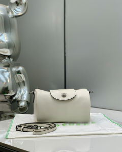 High-grade portable cylinder leather soft surface simple shoulder bag all crossbody pen holder bag niche design pillow bag