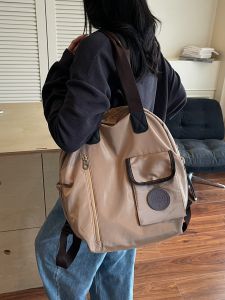 กระเป๋าเป้สะพายหลังผู้หญิงแบบลำลอง ความจุขนาดใหญ่ น้ำหนักเบา กระเป๋าสะพายไหล่แบบอเนกประสงค์ กระเป๋าเดินทางแบบกันน้ำ กระเป๋าเป้สะพายหลังแบบสองสี