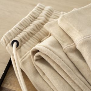 กางเกงวอร์มกีฬาผ้าฝ้ายแท้ทรงสลิมฟิตสำหรับผู้ชาย กางเกงขายาวลำลองสำหรับผู้หญิง ฤดูใบไม้ผลิและฤดูใบไม้ร่วง ทรงหลวม ทรงตรง ไม่ต้องรีด