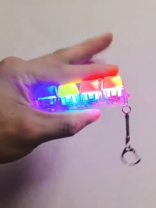 LED Light Fidget Keychain Toy with 9 Click Buttons for Stress Relief Mini Keyboard Puzzle Gadget Compact & Durable for Kids Teens Adults