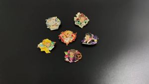 Bandai | Anime Tanjiro and Inosuke enamel pins colorful gold-rimmed pin set perfect collectible gift for birthdays and Christmas