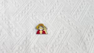 Bandai | Anime Straw Hat Pirate Character Enamel Pin - Manga Inspired Collectible Lapel Brooch for Anime Fans