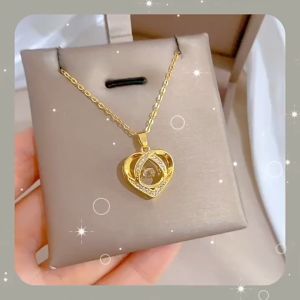 Ladamas Kalung Titanium Liontin Hati Dengan Permata Berikilau Bisa Bergerak Mewah KT109