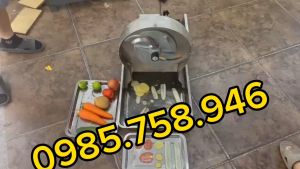 Máy thái rau củ quả đa năng chạy điện công suất 40W . Có nút điều chỉnh dày mỏng