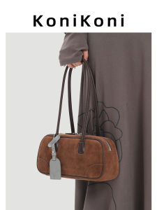 KoniKoni Genuine Leather Bowling Bag Womens New 2025 Underarm Single Shoulder Bag Soft Fabric Lining Zipper Closure Casual Use