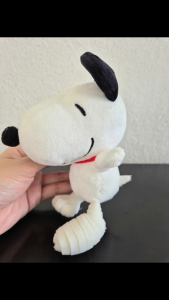 Hanging plushie (Snoopy with injured left foot that is wrapped with bandage)