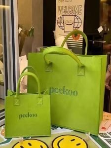 กระเป๋าถือโพลีเอสเตอร์อินเทรนด์แฟชั่นใหม่น่ารักพร้อมการปิดแสงและสายสะพายไหล่นุ่มเหมาะสําหรับเยาวชนและงานเลี้ยง