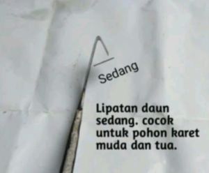 pisau penyadap karet bahan panrol atau paku rel kereta api
