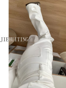 กางเกงยีนส์ทรงหลวมเอวต่ำสำหรับผู้หญิงในช่วงฤดูร้อน กางเกงขายาวทรงหลวมสีขาวสไตล์อเมริกันสำหรับผู้หญิงสูง กระดุมยาว