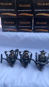 MÁY CÂU CÁ YOLO AC  KIM LOẠI VÒNG TUA 5-2.1 SÚC TẢI CÁ KHỎE MÀU ĐEN SAI 2000 TỚI 7000