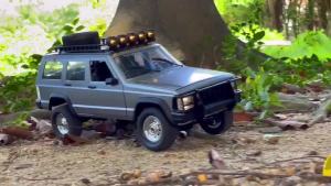 MN78 1/12 RC Car Cherokee Model 2.4G Off Road 4X4 Remote Control Car Jeep LED Light 4WD Climbing Electric Toy Car Gift for Boy