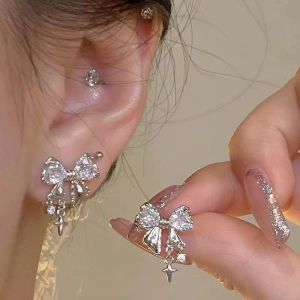 Sty⚡ Anting busur zirkonia mengkilap / anting bermutu tinggi / temperamen mode sederhana