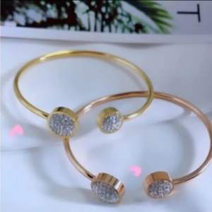 Gelang tangan titanium  fleksibel permata putih CXB455