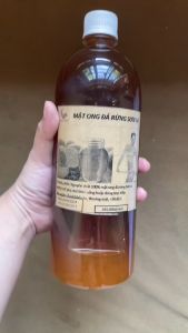 Mật Ong Đá Rừng Sơn La Nguyên Chất 100% chai 1 lít Nông Trang