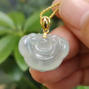 High Quality Ruyi Pendant Icy Translucent Natural Type A Jadeite added with 18k Clasp certificate weighs 3.65 grams measurement 16.3 * 21.4 * 5.2 mm (18kp94)