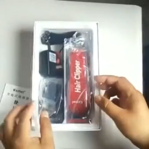 Kemei Hair Clipper KM-706Z with 3mm 6mm 10mm 13mm guards protective cover comb long battery life 1-year replacement warranty.