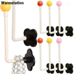 ที่แขวนเครื่องประดับพลาสติกแบบติดผนังราวแขวนผ้าจัดเก็บของแบบแขวนติดผนังชั้นวางแบบคาดศีรษะสำหรับติดตั้งกาวแบบง่าย