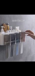 DuduMart Toothbrush holder with toothpaste dispenser squeeze toothpaste Storage