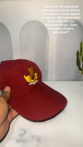 topi merah sd bordir tut wuri