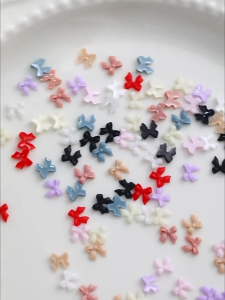 Đầy màu sắc Internet nổi tiếng mini cung nhỏ nghệ thuật làm móng đồ trang sức ba chiều nhựa nơ streamer phụ kiện nghệ thuật móng tay 10 cái / 20 cái / 50 cái